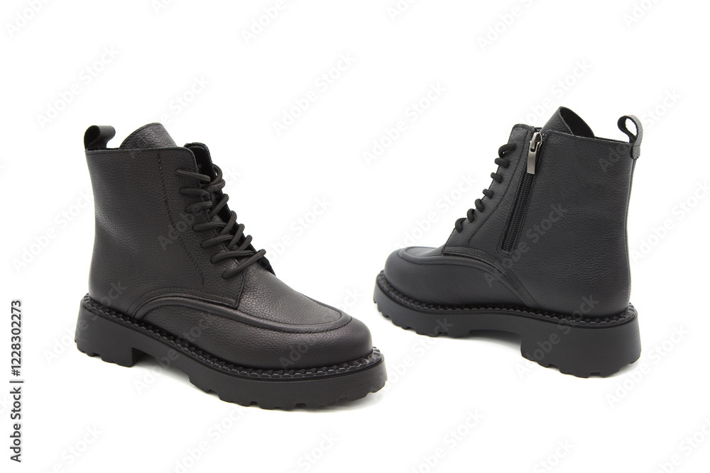 Fashionable leather lace-up boots with heels isolated on white background. View from all sides. Fashionable leather lace-up boots with heels isolated on white background. View from all sides.