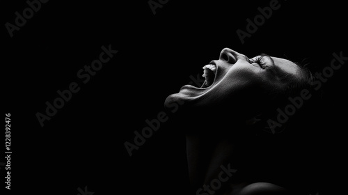 A Woman's Intense Scream Captured in Bold Black and White Imagery