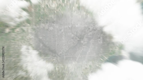 Earth zoom in from space to Clinton Township, Michigan, USA. Followed by zoom out through clouds and atmosphere into space. Satellite view. Travel intro. Images from NASA