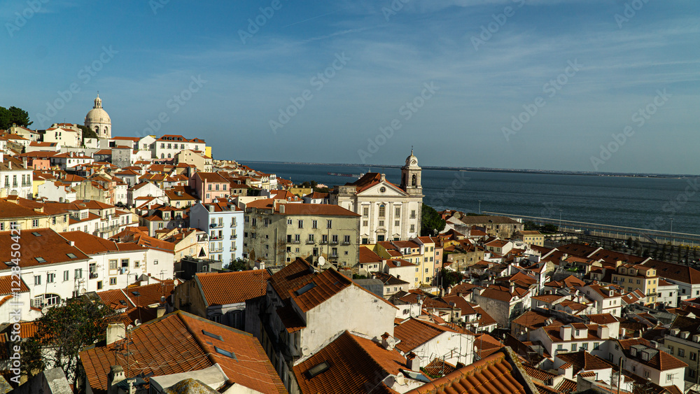 Fototapeta premium View of skyline of Lisbon shot from the famous Jardim do Torel view point in Lisbon, Portugal