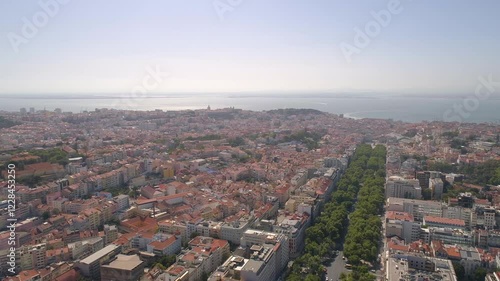 Wallpaper Mural LISBON, PORTUGAL - JANUARY 22, 2025: Stunning aerial view of Lisbon showcasing vibrant city life and beautiful coastal scenery Torontodigital.ca