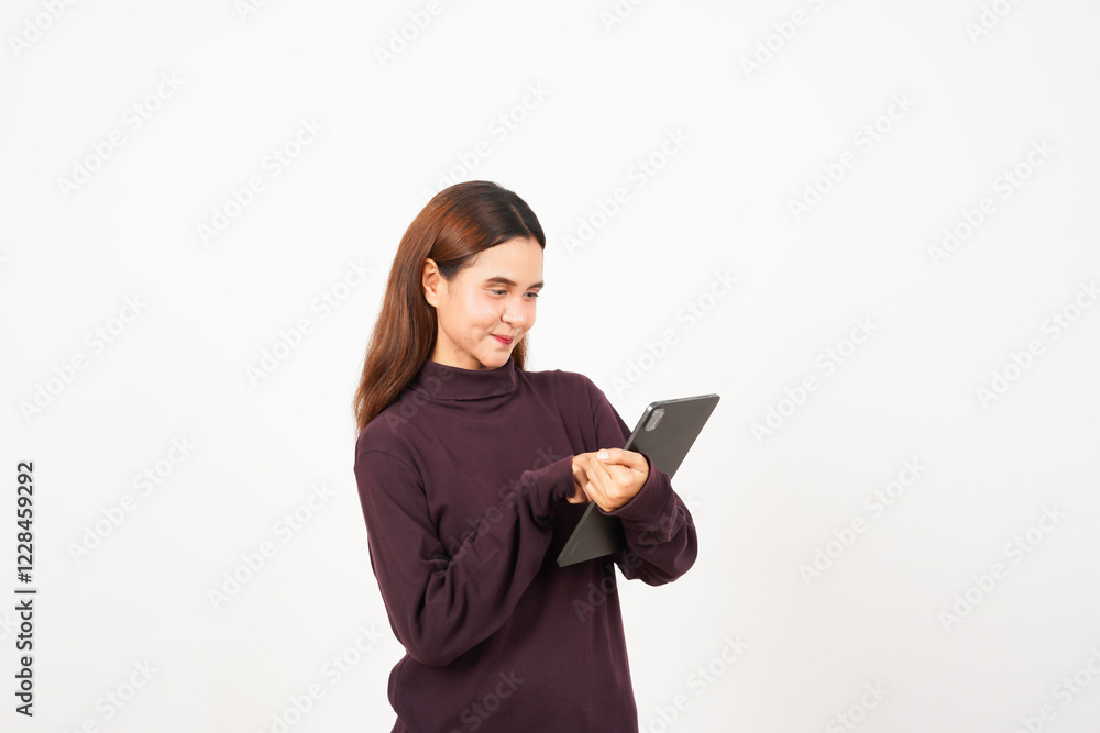 Smiling and Using a Tablet Of Beautiful Asian Woman Isolated On White Background Smiling and Using a Tablet Of Beautiful Asian Woman Isolated On White Background