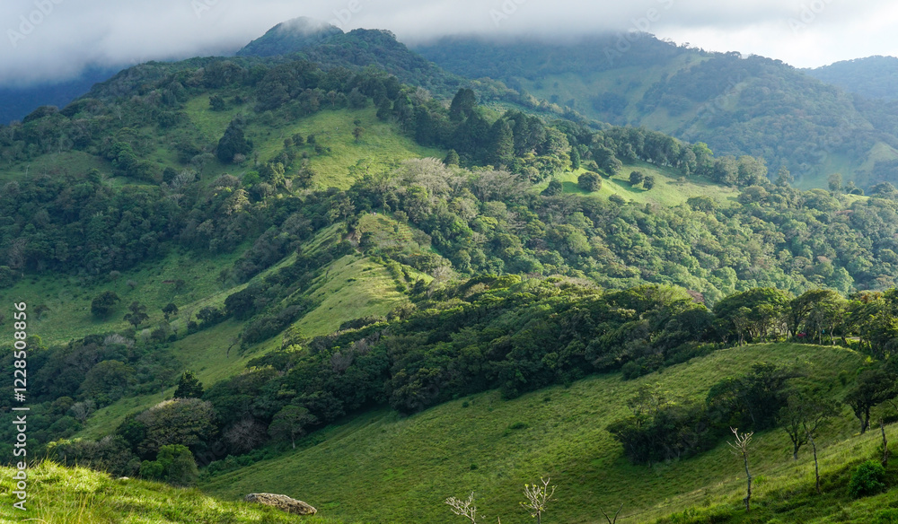 Scenic Green Mountains with Cloud-Covered Peaks in a Tropical Forest in Costa Rica Scenic Green Mountains with Cloud-Covered Peaks in a Tropical Forest in Costa Rica