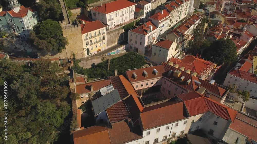 LISBON, PORTUGAL - JANUARY 22, 2025: Aerial view of colorful rooftops in historic neighborhood during sunny winter day LISBON, PORTUGAL - JANUARY 22, 2025: Aerial view of colorful rooftops in historic neighborhood during sunny winter day