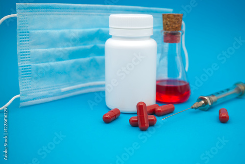 Medical, healthcare or Covid-19 still life with red capsules photo