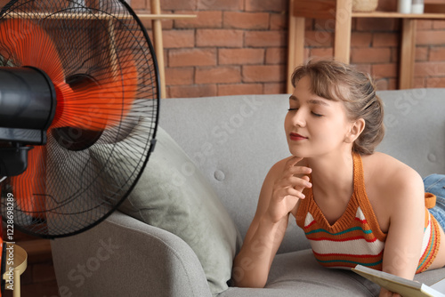 Young woman enjoying cool a...