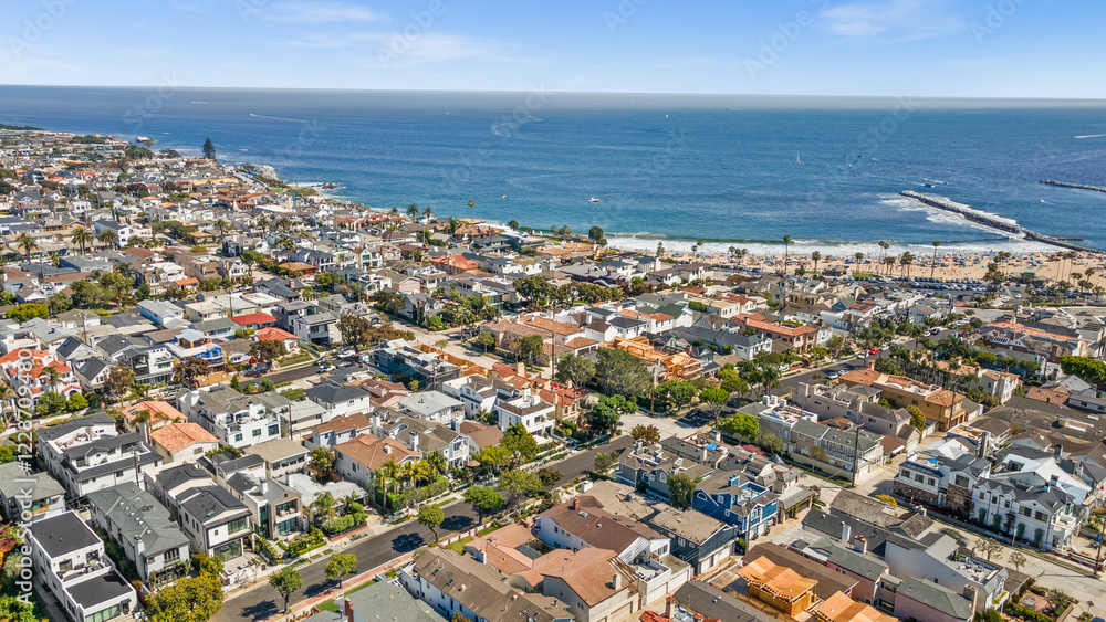 Fototapeta premium Luxury home, Newport Beach, ocean view, modern house, real estate, sunset photography, coastal property, high-end architecture, elegant design, premium listing, exterior lighting, waterfront home