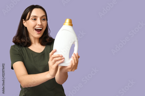 Young woman with bottle of ...