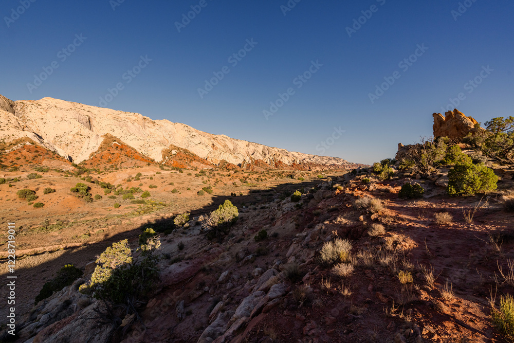 Obraz premium Geological Layers of Utah Showing Signs of Erosion at Sunset, Valley, Rock Walls, Desert, Stone