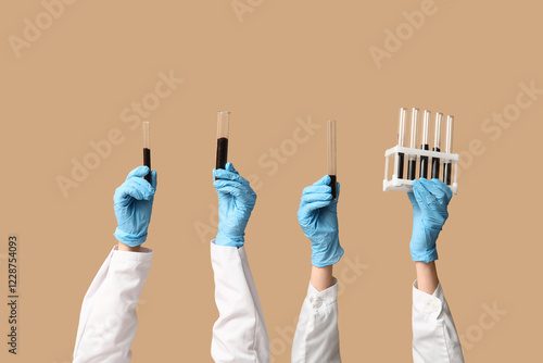 Scientist's hands holding t...