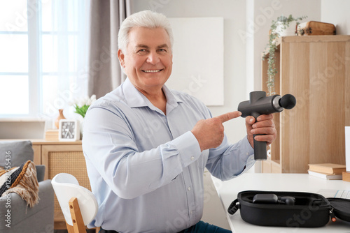 Mature businessman pointing...