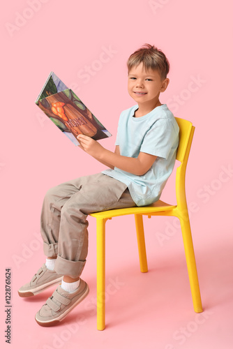 Cute little boy sitting on ...