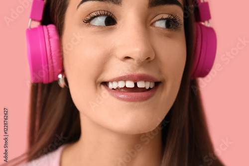 Young woman in headphones w...