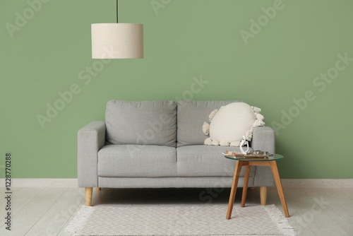 Hanging lamp, cozy sofa and...