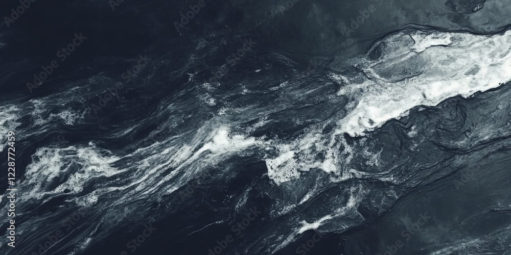 Fototapeta premium A deep charcoal black texture with soft highlights and subtle grain patterns