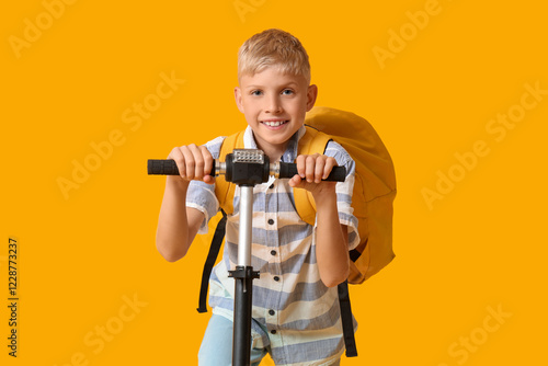 Cute schoolboy with modern ...