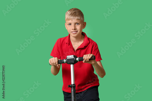 Cute boy with modern electr...
