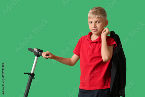 Cute schoolboy with modern ...