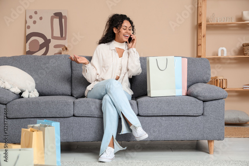 Happy young woman talking o...