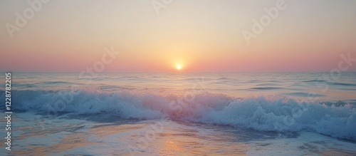 Serene sunrise over gentle ocean waves.