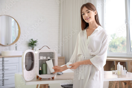 Young woman in a white robe...