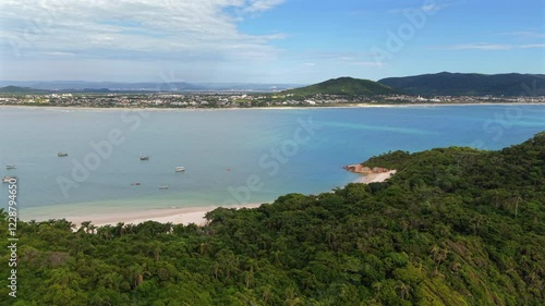 Wallpaper Mural Drone flight over Campeche Island with Campeche Beach and Greater Florianópolis in the background on a sunny day. Torontodigital.ca