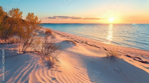 Wallpaper Mural A golden sandy beach at sunset, with long shadows stretching across the shore and a calm sea. Torontodigital.ca
