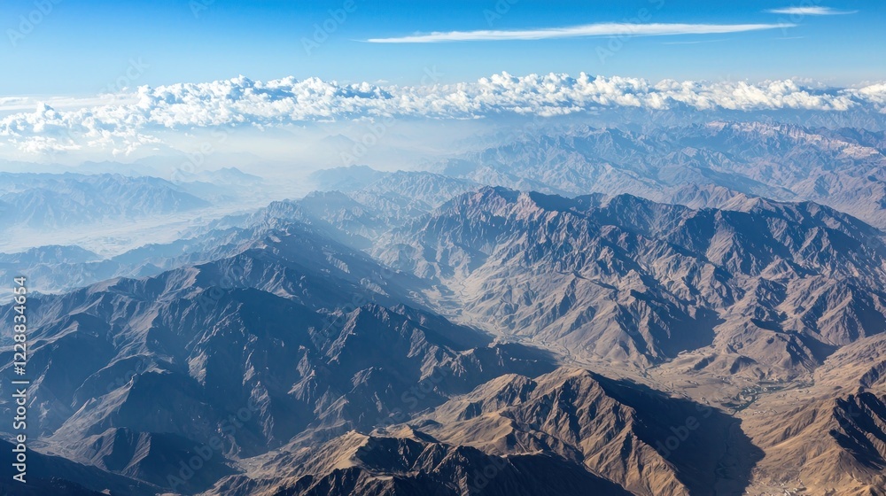 High-altitude view mountain range valleys ridges leading distance High-altitude view mountain range valleys ridges leading distance