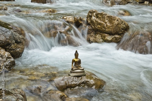 Bhumispara mudra, Buddha Gautama at the moment of enlightenment, statue in a mountain stream, Oytal Valley, Allgaeu, Bavaria, Germany, Europe, PublicGround, Europe photo