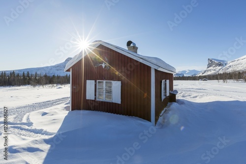 Wooden huts STF Aktse Fjällstuga in winter, Skierffe, Kungsleden or Königsweg, Province of Lapland, Sweden, Europe photo