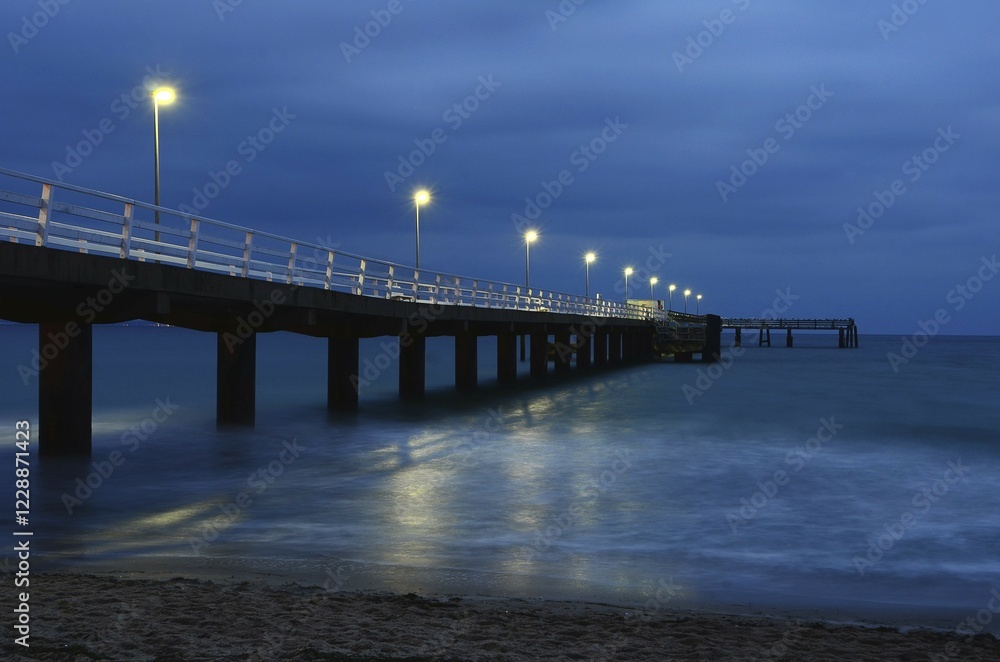 Obraz premium Blue Hour Sea Bridge, Timmendorfer Strand, Baltic Sea, Schleswig-Holstein, Germany, Europe