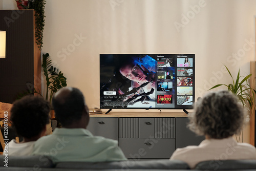 Watching Movie Together on Screen at Home During Evening