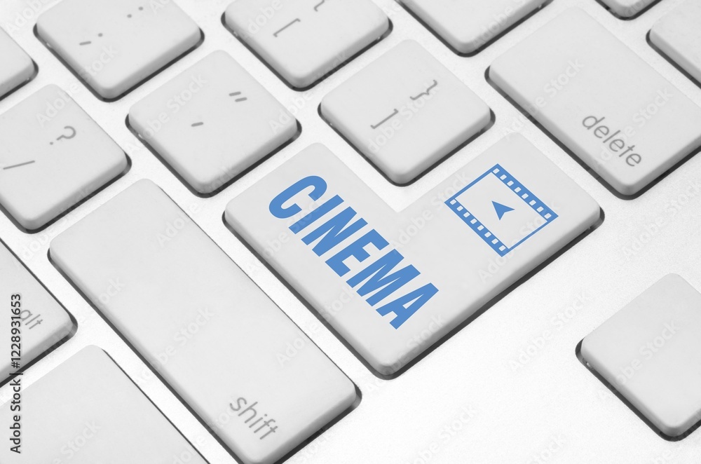 Business concept: Cinema key on the computer keyboard