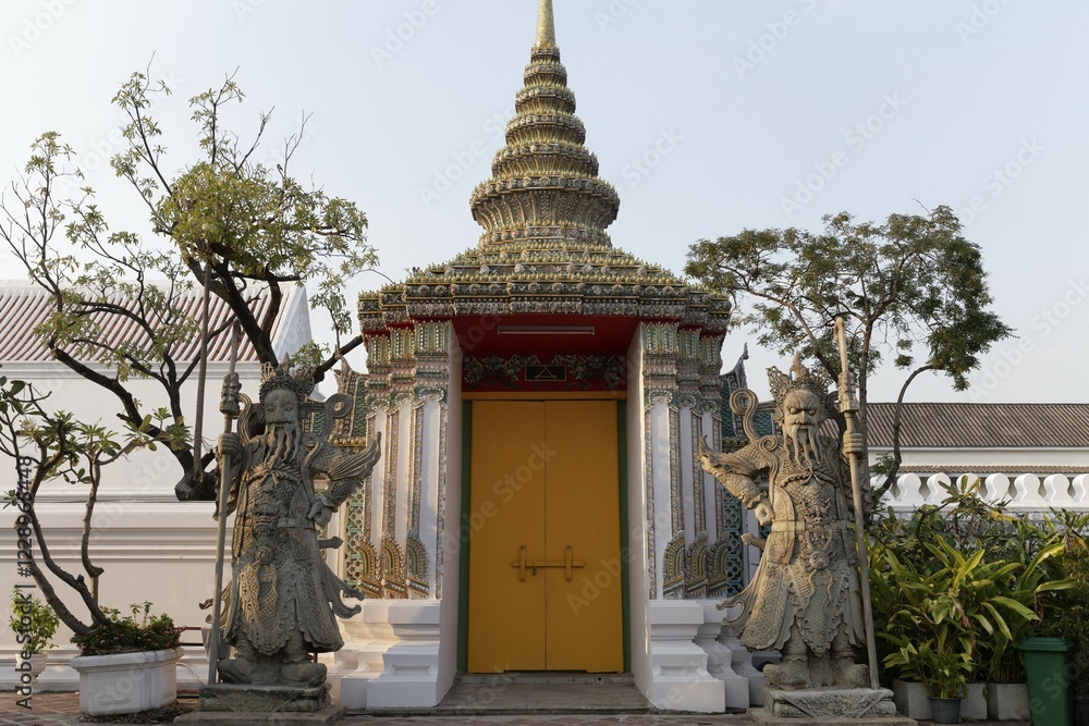 Entrance with Chinese guardian figures, Wat Pho, Buddhist temple complex, Rattanakosin, Bangkok, Thailand, Asia Entrance with Chinese guardian figures, Wat Pho, Buddhist temple complex, Rattanakosin, Bangkok, Thailand, Asia