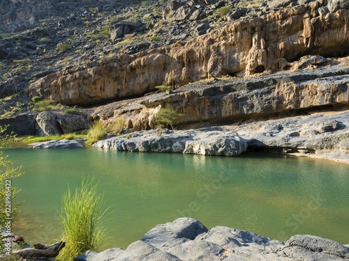 Clear water in Wadi Dam, Hajar al Gharbi Mountains, Al Dhahirah Region, Arabia, Middle East, Oman, Asia photo