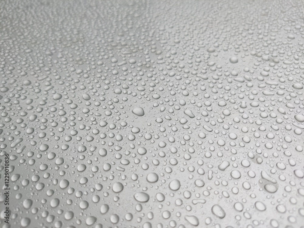 Water droplet on a gray background Water droplet on a gray background