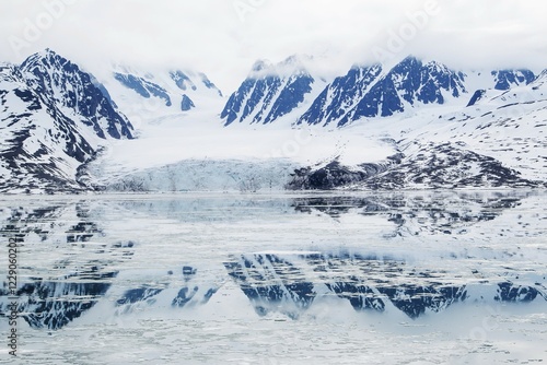 Monacobreen glacier, reflected in the water, Liefdefjorden, Spitzbergen, Norway, Europe photo