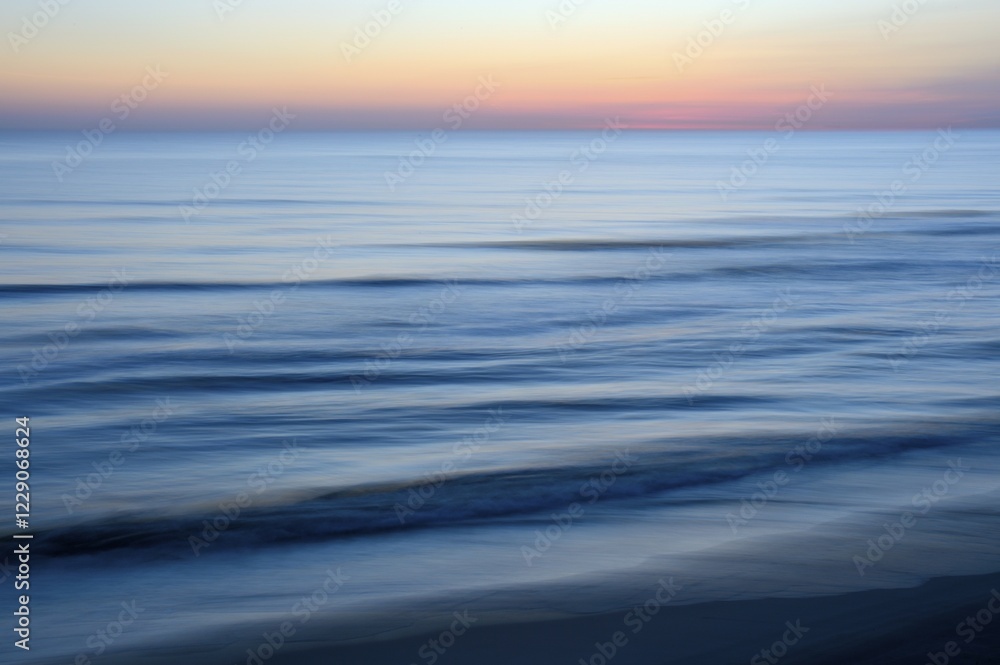 Obraz premium Sunset at the North Sea, Texel, North Holland, Netherlands