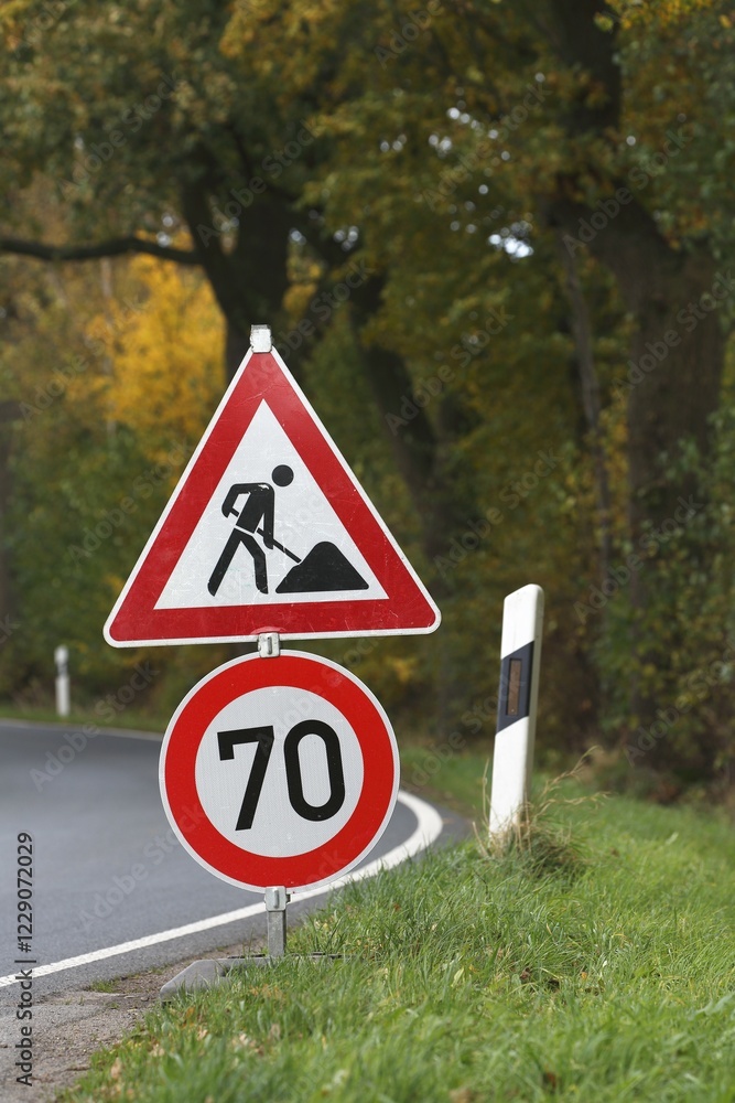 custom made wallpaper toronto digitalRoad sign on curve, speed limit and construction work, Schleswig-Holstein, Germany, Europe