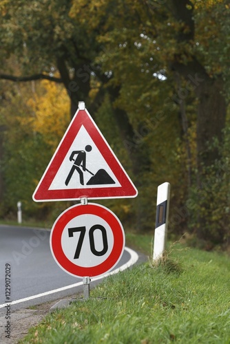 Road sign on curve, speed limit and construction work, Schleswig-Holstein, Germany, Europe