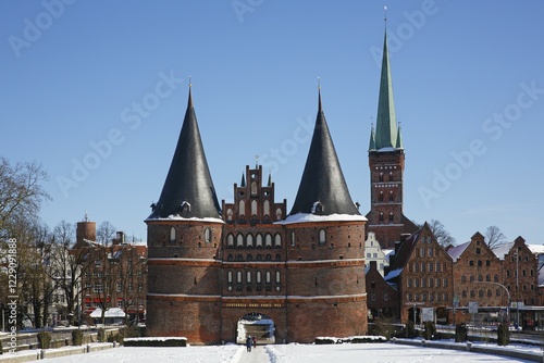 Wallpaper Mural Holstentor in winter in the snow, Salzspeicher and church St. Petri, Lübeck, Schleswig-Holstein, Germany, Europe Torontodigital.ca