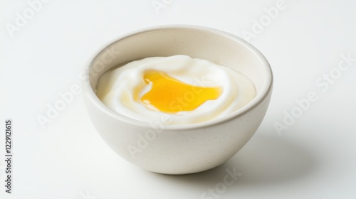 Obraz na płótnie A minimalist bowl of plain yogurt topped with a drizzle of honey, served in a simple white ceramic bowl, Yogurt centered w salonie