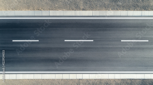 Wallpaper Mural seamless top down view of modern asphalt highway with clear lane markings, showcasing smooth surface and surrounding gravel. image evokes sense of openness and tranquility Torontodigital.ca