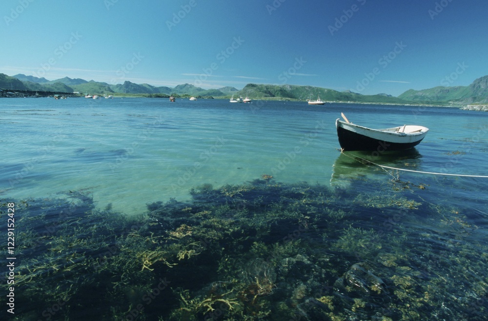 Fototapeta premium Rowing boat in bay, Lofotes, Norway, Europe