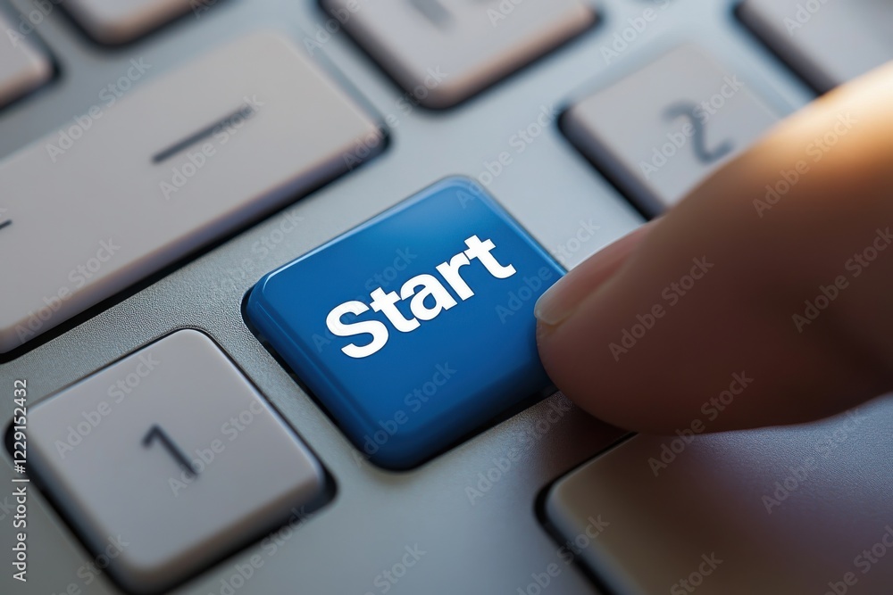 Close-up of Finger Pressing Start Button on Computer Keyboard Close-up of Finger Pressing Start Button on Computer Keyboard