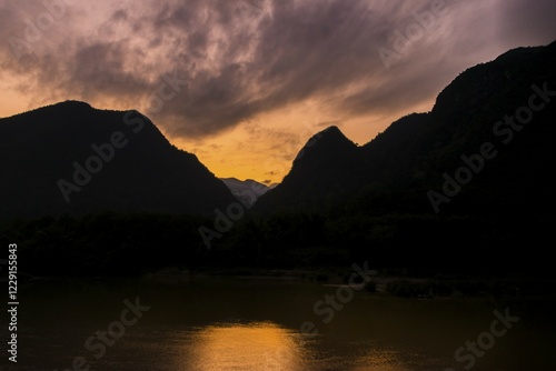 River landscape, mountains, Karst mountains on the Nam Ou River, Sunset, Nong Khiaw, Luang Prabang Province, Laos, Asia photo