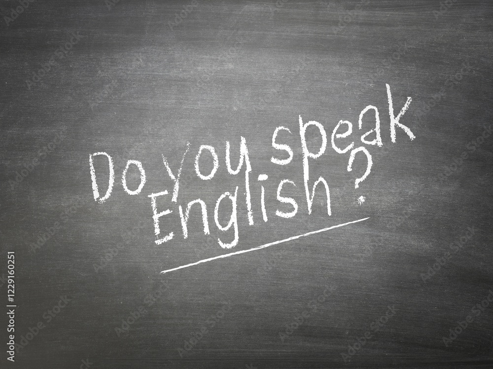 Obraz premium Learning language concept on a blackboard with the words Do you speak English?