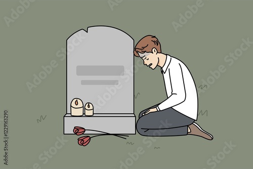 Obraz na plátně Sad man sitting near grave at cemetery mourning after passed wife or mother