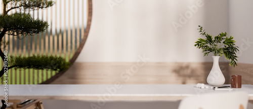 A minimalist wooden tabletop, adorned with a simple vase, set in a contemporary Japandi-style room. photo