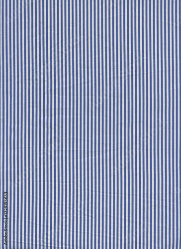 white fabric with blue stripes . cotton shirt fabric . close up pattern, cotton fabric texture
